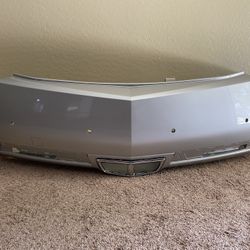 Factory OEM 2011-2015 Cadillac CTS Silver Rear Bumper Cover With Sensor Holes Chrome Exhaust Bezel 