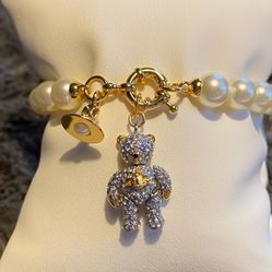 Vivienne Westwood encrusted teddy bear bracelet with small Saturn orb