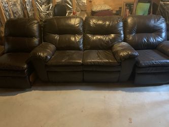 Brown leather couch with recliners
