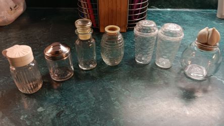 7 small 2 plastic containers  can be used with anything