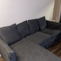 Gray couch With ottoman 