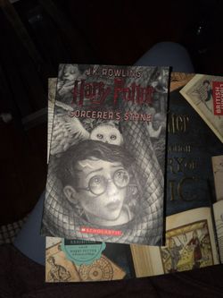 of Harry Potter and the Sorcerer's Stone by J.K. Rowling, featuring cover art by illustrator Brian Selznick.