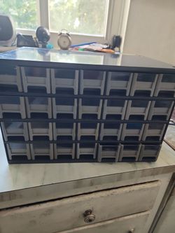 Steel cabinet with 28 drawers