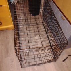 LARGE DOOR DOG CAGE 36" L  x  22" W x. 24" H