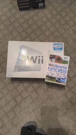 Wii complete in box with Wii sports