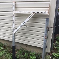 Adjustable rear ladder rack for pick up truck