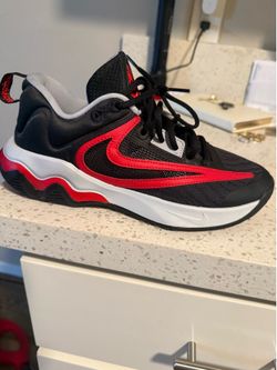 Black and red Nike shoes