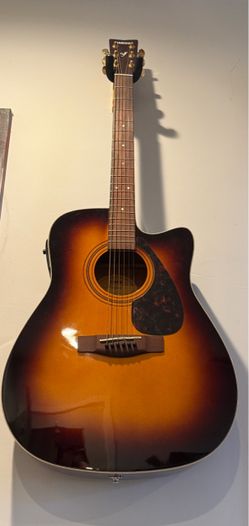 Yamaha acoustic guitar with accessories