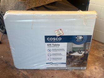 Brand new 6 foot table still in the package