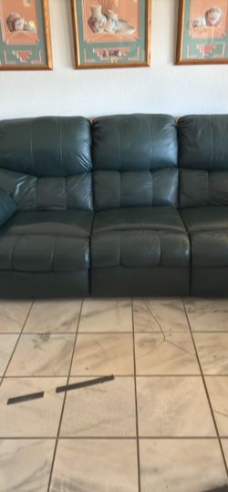 Sofa & Recliner. Color: Hunter Green3 seater..No rips or tears. Excellent condition. Leather . Cash & Carry
