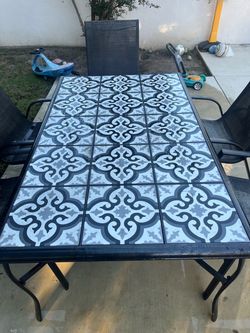 Outdoor patio table and chairs