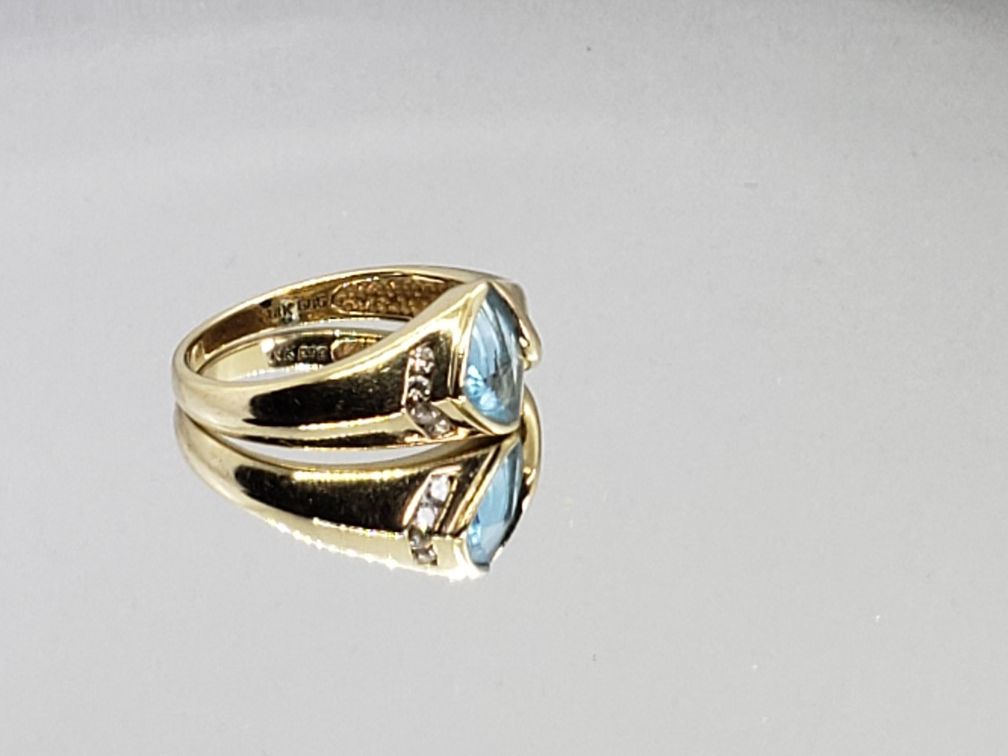 14k Blue Topaz Diamond Ring