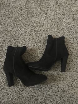 Black high heel boots, size 7
