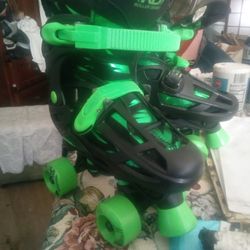 Green roller skates
