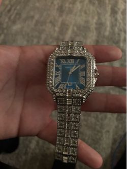 Blue face iced out Cartier