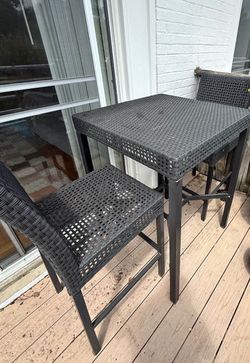 2 Black Wicker Bar Stools and Table