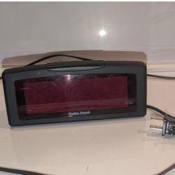 vintage RadioShack digital alarm clock featuring the "Battery Sentinel" system. This specific model (often cataloged as 63-754 or 63-771) was a staple
