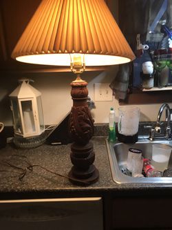 Vintage table wood base carved with leaves lamp.