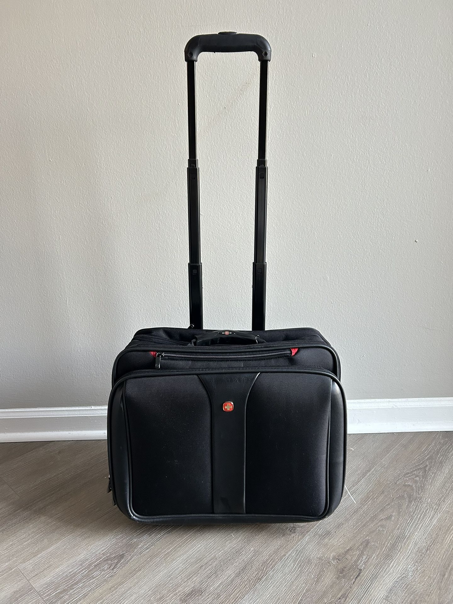 Swiss Black Multiple Compartments Travel Carrier With Rolling Wheels And Adjustable Handle Bag