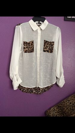New dressy sheer blouse back is cheetah size M