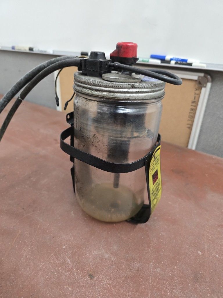 Automatic Windshield Wiper Fluid Reservoir