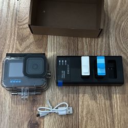 GoPro 11 Black + Waterproof Case + Extra Batteries + Battery Charger