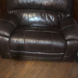 Recliner And a An Oversized Swivel Chair 