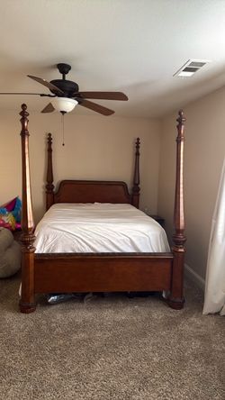 Wood Four-Poster Bed Frame- Price is negotiable.