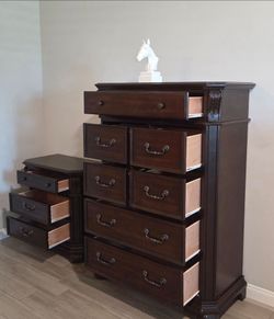 Sturdy Wood Dresser With 1 Nightstand. Used, in good condition. 
Normal Wear! All drawers are dovetailed and glide smoothly!
