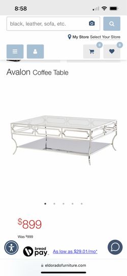 Glass and chrome cocktail table