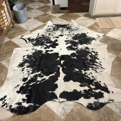 black and white cowhide rug 92”x69”
