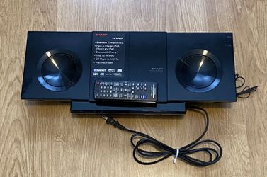 Sharp DK-KP85P Slim Micro System features a top-mounted dock for Apple Lightning devices The system also supports Bluetooth technology for wireless