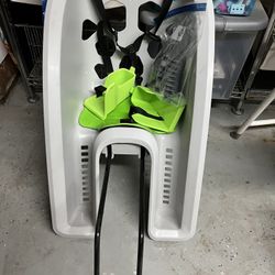 Bell shell rear child carrier