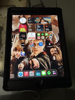 apple ipad 6th generation 9.7 With New Headphones And Otterbox  Case 