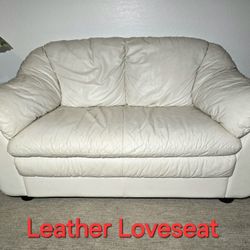 Natuzzi Italia cream colored pu Leather Loveseat