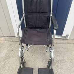 Transport Wheelchair.