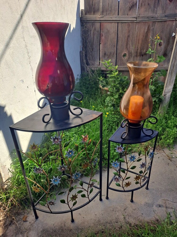 two stands with two vases