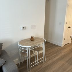 TWO PERSON DINING TABLE AND CHAIRS