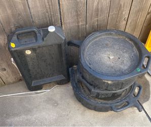 Draining oil containers