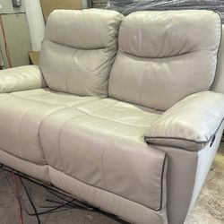 Messina Leather Power Reclining Loveseat with Power Headrests   Retails for over $500 Was a floor model unit, still looks great  Features: Color: Crea