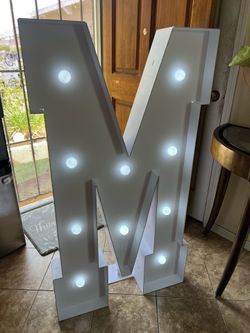 Marquee letter M