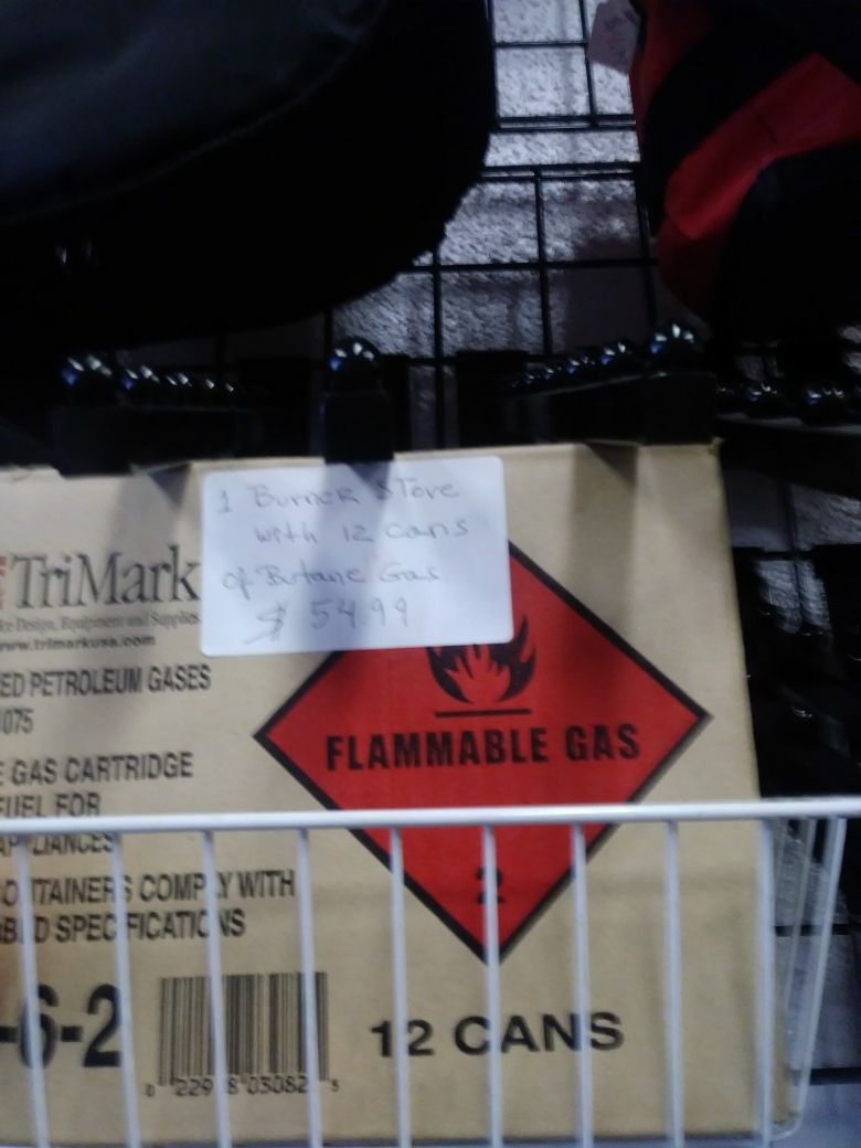 Tri mark propane stove with 12 bottles of propane