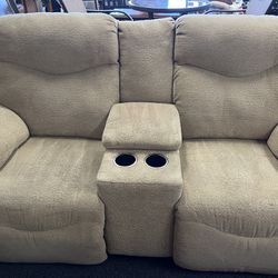 Tan Reclining Loveseat With CupHolders And Storage 