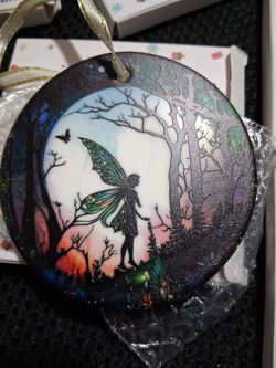 Faries and Elfs  dragon elf glass ornament ( see all images).