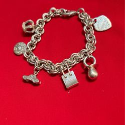 Tiffiney And Company #925 Charm Bracelet At A Special Price Of Only $195