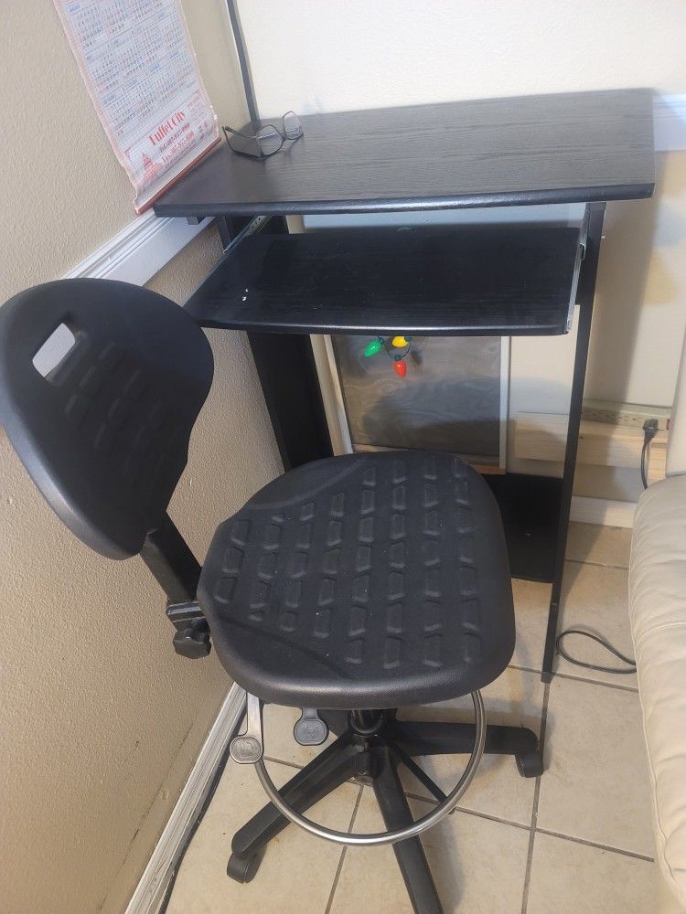 Computer table and chair.
