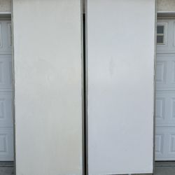 Two Sliding Closet Doors ,missing wheels 