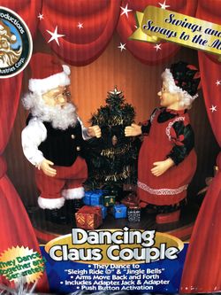 Dancing Claus couple