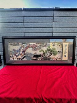 A silk embroidery, framed, Along the river