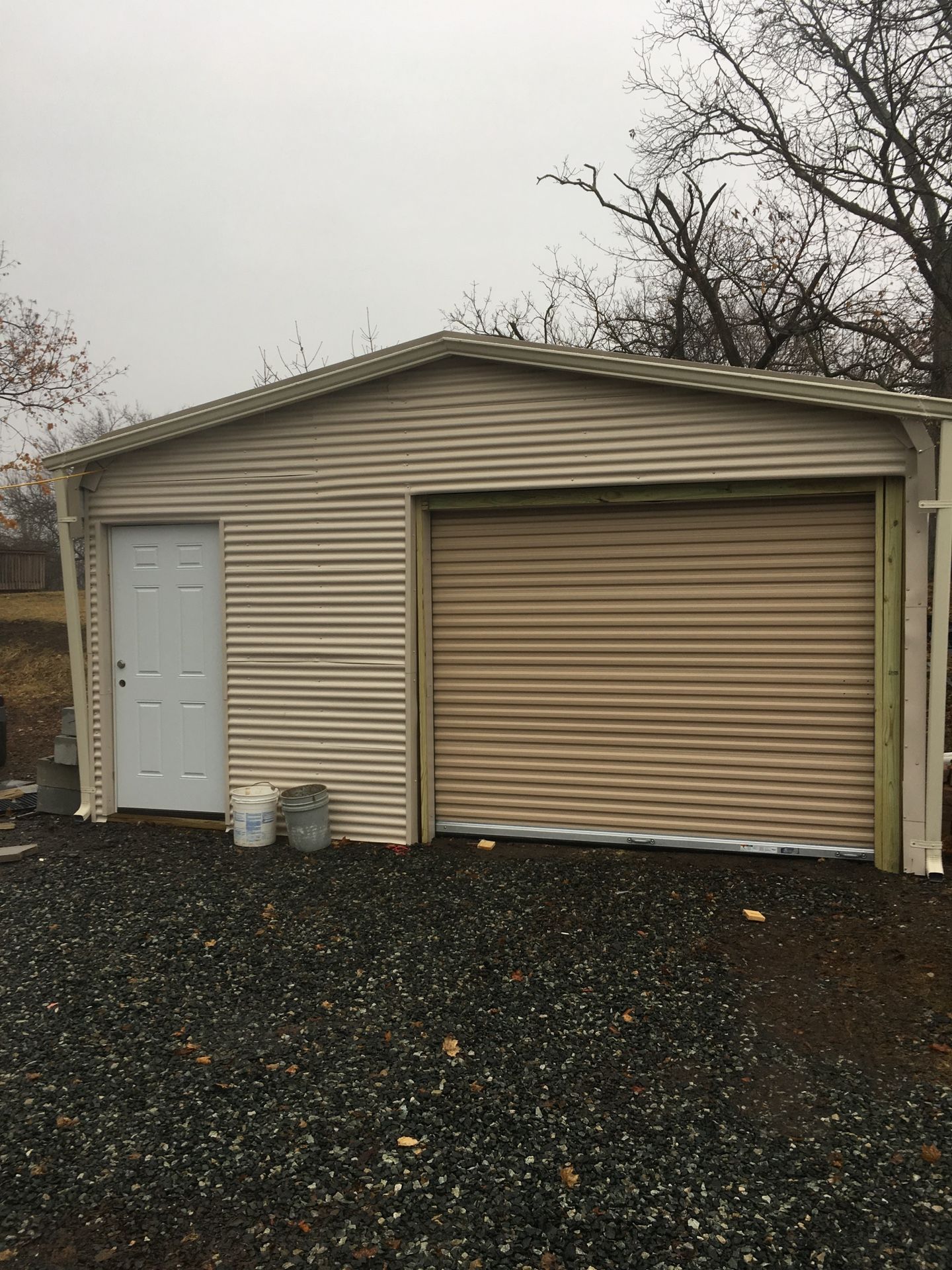 31’ x 18’ extra high fully contained rollup, garage door entranceway fully on assemble